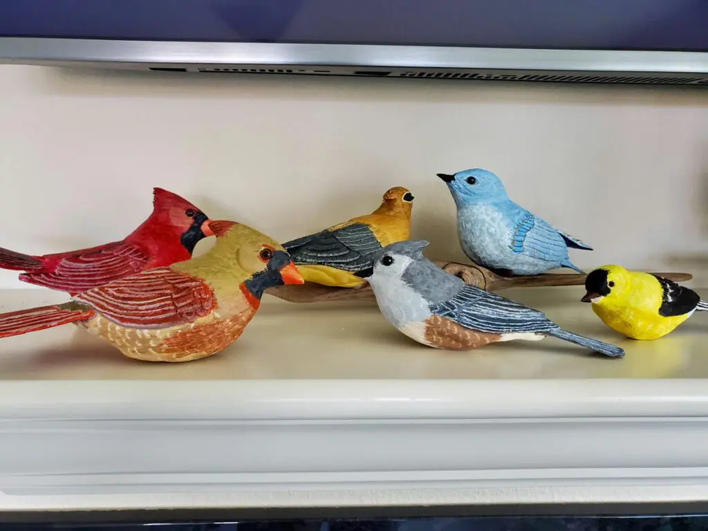 Trillium Woods Resident Felix Tristani's wooden birds sculptures
