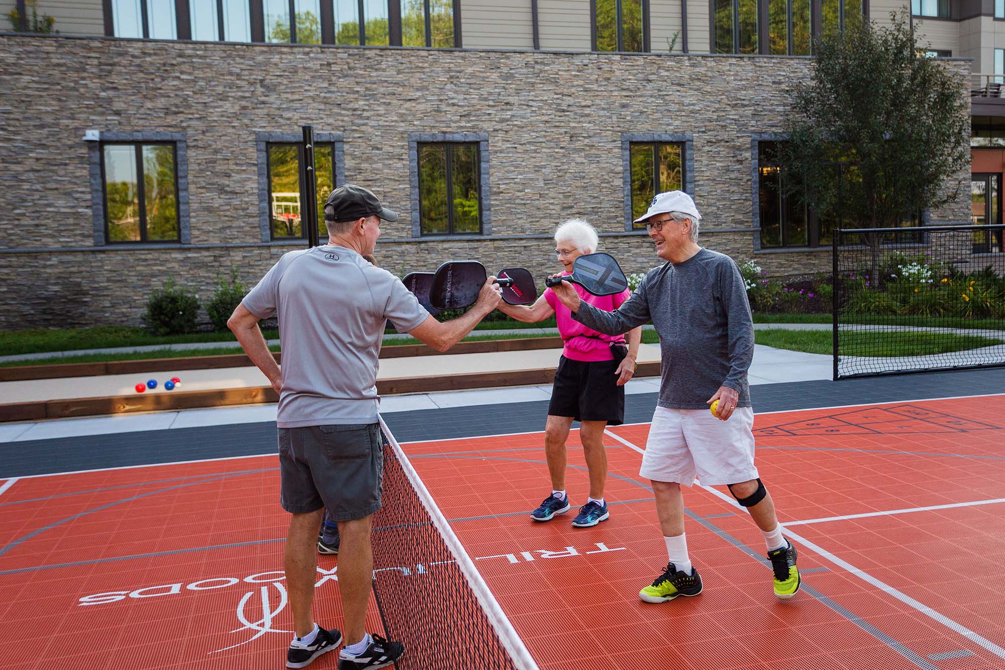 older adults in the independent living community engaging in sports