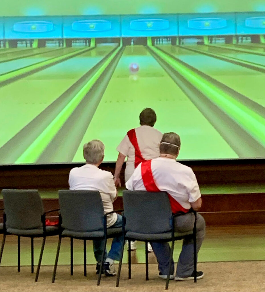 Senior residents enjoy virtual bowling.